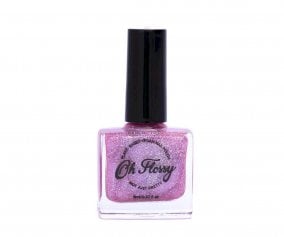 Esmalte de unhas rosa com glitter